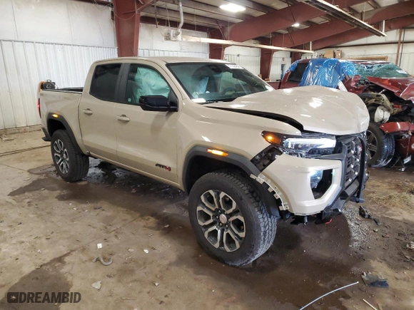 2024 GMC Canyon 4WD AT4 with VIN 1GTP6DEK7R1130962, listed as a Copart auction lot 77139454 with 3,236 mi miles and Salvage Title. Bid and sale history available at carsss.com. Image 4.