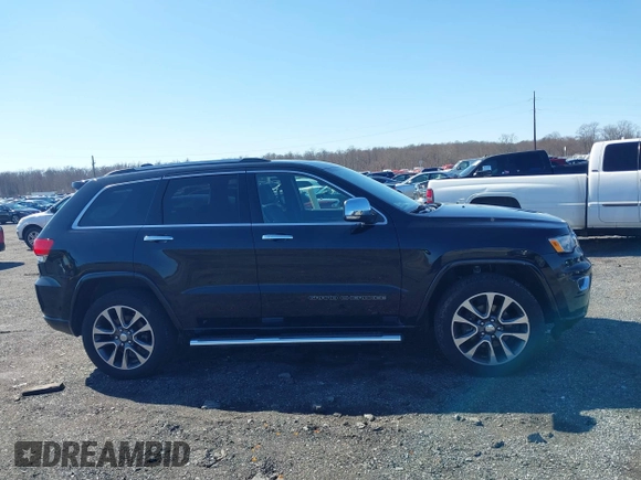 2018 Jeep Grand Cherokee High Altitude with VIN 1C4RJFCT6JC102660, listed as a IAAI auction lot 41752965 with 119,841 mi miles. Bid and sale history available at carsss.com. Image 13.