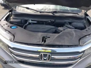 2016 Honda Pilot LX with VIN 5FNYF5H10GB044006, listed as a IAAI auction lot 42075404 with 129,642 mi miles and . Bid and sale history available at DreamBid. Image 10.