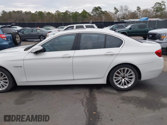 2015 BMW 5 Series 528i with VIN WBA5A5C5XFD516999, listed as a IAAI auction lot 41195184 with 131,187 mi miles. Bid and sale history available at carsss.com. Image 13.