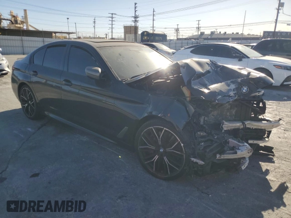 2021 BMW 5 Series M550i xDrive z VIN WBA13BK06MCF92173, wystawiony jako Copart lot #87707035 z przebiegiem Nie podano mil oraz Szkoda całkowita • Salvage title. Historia ofert i sprzedaży dostępna na DreamBid. Obrazek 4.