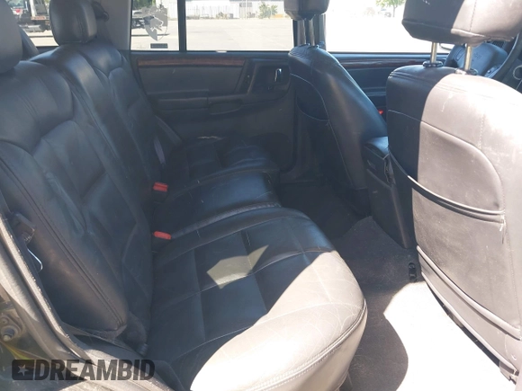 1997 Jeep Grand Cherokee Limited z VIN 1J4GZ78Y3VC683674, wystawiony jako IAAI lot #42331984 z przebiegiem 227 226 mil mil oraz . Historia ofert i sprzedaży dostępna na DreamBid. Obrazek 8.