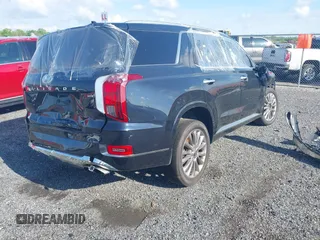 2020 Hyundai Palisade Limited with VIN KM8R5DHE3LU057298, listed as a IAAI auction lot 42124983 with 102,643 mi miles and . Bid and sale history available at DreamBid. Image 4.