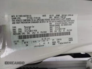 2014 Ford Focus Titanium with VIN 1FADP3N24EL184220, listed as a IAAI auction lot 42429610 with 172,575 mi miles and . Bid and sale history available at DreamBid. Image 9.