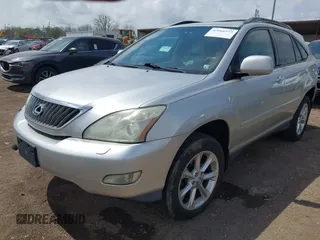 2008 Lexus RX with VIN 2T2HK31U58C053306, listed as a IAAI auction lot 42066973 with 184,266 mi miles. Bid and sale history available at carsss.com. Image 2.