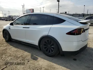 2021 Tesla Model X Long Range Plus with VIN 5YJXCBE22MF311576, listed as a Copart auction lot 53541595 with 83,137 mi miles and Salvage Title. Bid and sale history available at carsss.com. Image 2.