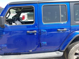 2018 Jeep Wrangler Unlimited Sahara z VIN 1C4HJXEN4JW321227, wystawiony jako IAAI lot #42002735 z przebiegiem 114 293 mil mil oraz . Historia ofert i sprzedaży dostępna na DreamBid. Obrazek 14.
