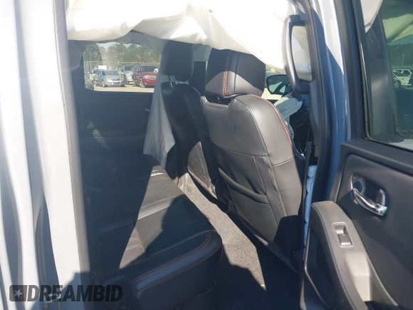 2023 Nissan Frontier Pro-4X with VIN 1N6ED1EK7PN604374, listed as a IAAI auction lot 41828936 with 60,452 mi miles and . Bid and sale history available at DreamBid. Image 8.