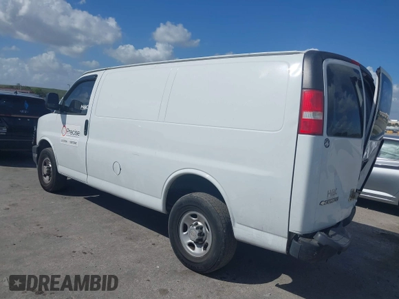 2018 Chevrolet Express Cargo Van with VIN 1GCWGAFP0J1177319, listed as a IAAI auction lot 41575100 with 132,479 mi miles. Bid and sale history available at carsss.com. Image 3.
