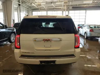 2015 GMC Yukon XL Denali with VIN 1GKS2JKJXFR528927, listed as a IAAI auction lot 41391259 with 159,467 mi miles. Bid and sale history available at carsss.com. Image 16.