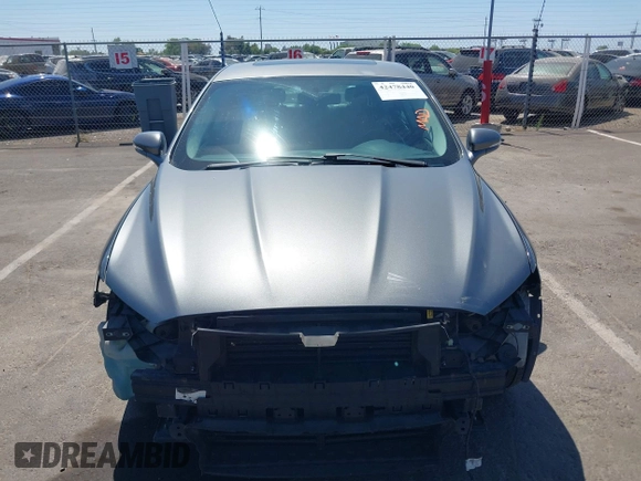 2014 Ford Fusion SE Hybrid with VIN 3FA6P0LU5ER393530, listed as a IAAI auction lot 42478440 with 93,728 mi miles and . Bid and sale history available at DreamBid. Image 13.