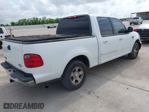 2003 Ford F-150 XLT with VIN 1FTRW07623KD58824, listed as a IAAI auction lot 42124403 with Not Provided miles. Bid and sale history available at carsss.com. Image 4.