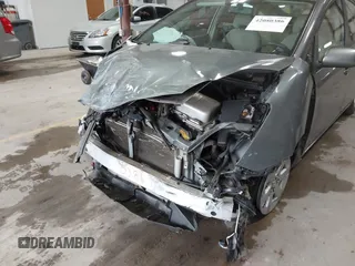 2005 Toyota Prius with VIN JTDKB20U453123405, listed as a IAAI auction lot 42080386 with 262,688 mi miles and . Bid and sale history available at DreamBid. Image 6.