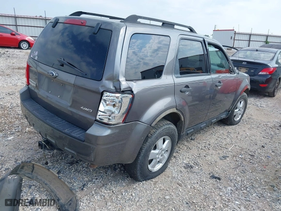 2009 Ford Escape XLT with VIN 1FMCU93G69KC27205, listed as a IAAI auction lot 40152013 with 187,084 mi miles. Bid and sale history available at carsss.com. Image 4.