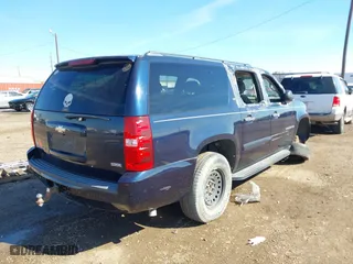 2009 Chevrolet Suburban LS with VIN 1GNFC16029R200974, listed as a IAAI auction lot 41370873 with 207,649 mi miles. Bid and sale history available at carsss.com. Image 4.