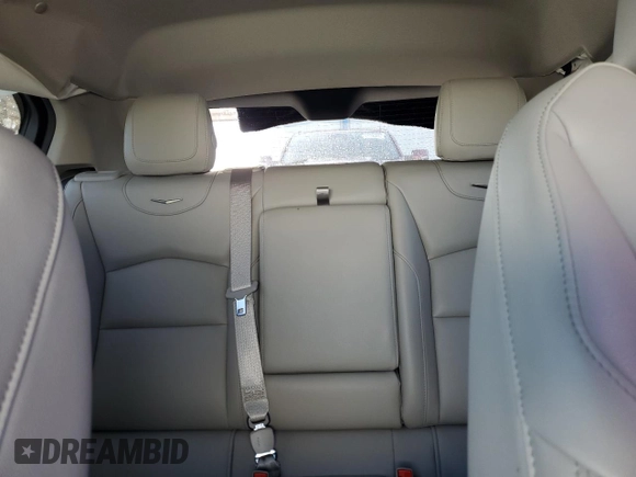2023 Cadillac XT4 FWD Luxury with VIN 1GYAZAR42PF219114, listed as a Copart auction lot 61830125 with 23,508 mi miles and Salvage title. Bid and sale history available at DreamBid. Image 10.