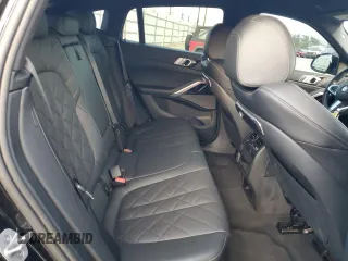 2024 BMW X6 xDrive40i with VIN 5UX33EX02R9U49162, listed as a Copart auction lot 85107534 with 14,888 mi miles and Salvage Title. Bid and sale history available at carsss.com. Image 11.