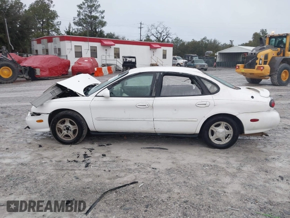 1999 Ford Taurus SE with VIN 1FAFP53S4XA185115, listed as a IAAI auction lot 41263216 with 182,770 mi miles. Bid and sale history available at carsss.com. Image 14.