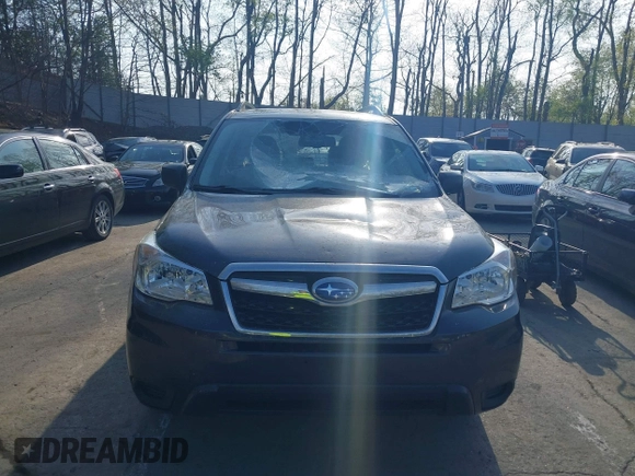 2015 Subaru Forester 2.5i with VIN JF2SJABCXFH599231, listed as a IAAI auction lot 42166220 with 60,409 mi miles and . Bid and sale history available at DreamBid. Image 13.