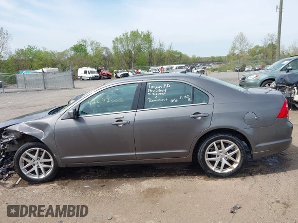 2012 Ford Fusion SEL with VIN 3FAHP0JA4CR390200, listed as a IAAI auction lot 42092002 with 180,839 mi miles and . Bid and sale history available at carsss.com. Image 14.