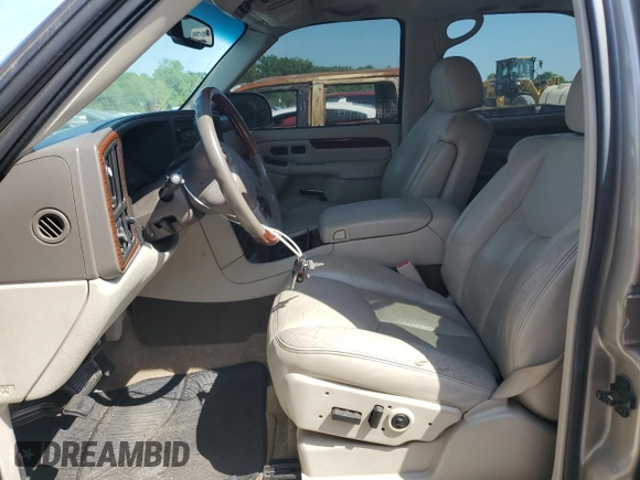 2003 Cadillac Escalade z VIN 1GYEC63T83R157632, wystawiony jako Copart lot #54950564 z przebiegiem 88 527 mil mil oraz Szkoda całkowita • Salvage title. Historia ofert i sprzedaży dostępna na DreamBid. Obrazek 7.