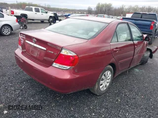 2006 Toyota Camry STD z VIN 4T1BE32K36U165094, wystawiony jako IAAI lot #41920150 z przebiegiem 136 986 mil mil oraz . Historia ofert i sprzedaży dostępna na DreamBid. Obrazek 4.
