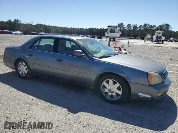 2003 Cadillac DeVille DTS z VIN 1G6KF579X3U233215, wystawiony jako Copart lot #48636775 z przebiegiem 99 144 mil mil oraz Nie do naprawy. Historia ofert i sprzedaży dostępna na DreamBid. Obrazek 4.