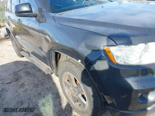 2011 Jeep Grand Cherokee Laredo with VIN 1J4RR4GG2BC670264, listed as a IAAI auction lot 41670045 with 252,044 mi miles. Bid and sale history available at carsss.com. Image 6.