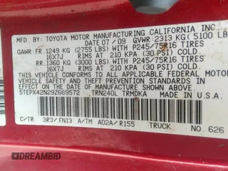 2009 Toyota Tacoma with VIN 5TEPX42N29Z669572, listed as a IAAI auction lot 41954697 with 146,908 mi miles. Bid and sale history available at carsss.com. Image 9.