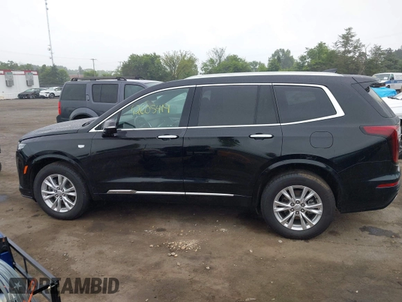2024 Cadillac XT6 AWD Luxury with VIN 1GYKPBR45RZ750986, listed as a IAAI auction lot 42605419 with 50,929 mi miles and . Bid and sale history available at DreamBid. Image 15.