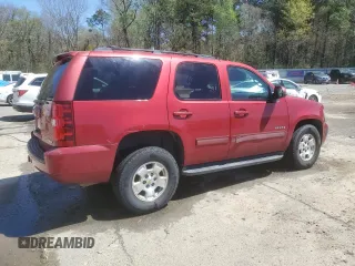 2012 Chevrolet Tahoe LS with VIN 1GNSCAE02CR319700, listed as a Copart auction lot 50321735 with 180,403 mi miles and Salvage title. Bid and sale history available at DreamBid. Image 3.