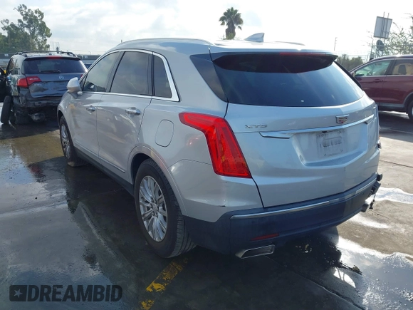 2017 Cadillac XT5 FWD with VIN 1GYKNARS7HZ144148, listed as a IAAI auction lot 41392399 with 96,252 mi miles and . Bid and sale history available at carsss.com. Image 3.
