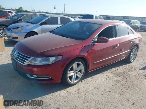2013 Volkswagen CC Sport with VIN WVWBP7AN4DE558398, listed as a IAAI auction lot 41975725 with 161,982 mi miles. Bid and sale history available at carsss.com. Image 2.
