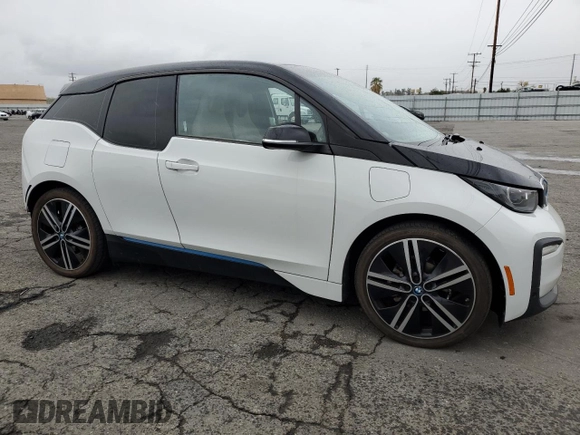 2019 BMW i3 with VIN WBY8P4C54K7D09611, listed as a Copart auction lot 48233235 with 59,853 mi miles and Salvage Title. Bid and sale history available at carsss.com. Image 4.