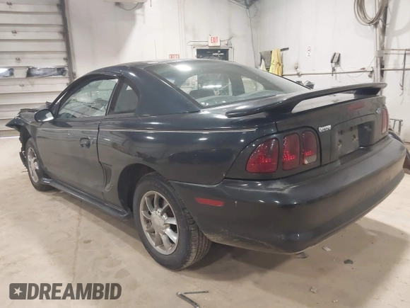 1997 Ford Mustang with VIN 1FALP4041VF157548, listed as a IAAI auction lot 39894591 with 146,891 mi miles. Bid and sale history available at carsss.com. Image 3.
