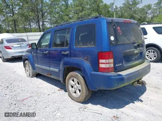 2009 Jeep Liberty Sport with VIN 1J8GN28K09W510269, listed as a IAAI auction lot 42019437 with 123,006 mi miles. Bid and sale history available at carsss.com. Image 3.