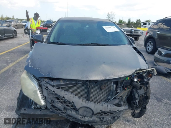 2013 Toyota Corolla L with VIN 5YFBU4EE3DP078437, listed as a IAAI auction lot 42024770 with 102,321 mi miles and . Bid and sale history available at DreamBid. Image 6.