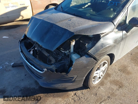 2017 Ford Fiesta SE z VIN 3FADP4BJ6HM125903, wystawiony jako IAAI lot #41376018 z przebiegiem 114 628 mil mil oraz . Historia ofert i sprzedaży dostępna na DreamBid. Obrazek 6.