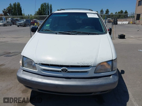 2000 Toyota Sienna CE z VIN 4T3GF19C8YU307987, wystawiony jako IAAI lot #42363309 z przebiegiem 179 374 mil mil oraz . Historia ofert i sprzedaży dostępna na DreamBid. Obrazek 12.