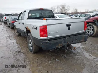 2006 Dodge Dakota ST with VIN 1D7HW28K76S507001, listed as a IAAI auction lot 41618353 with 127,825 mi miles and . Bid and sale history available at DreamBid. Image 3.