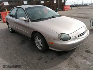 1999 Ford Taurus SE with VIN 1FAFP53S9XA330603, listed as a IAAI auction lot 41819819 with 207,025 mi miles. Bid and sale history available at carsss.com. Image 1.
