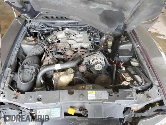 2003 Ford Mustang Standard z VIN 1FAFP404X3F342630, wystawiony jako Copart lot #66846924 z przebiegiem 191 297 mil mil oraz Szkoda całkowita • Salvage title. Historia ofert i sprzedaży dostępna na DreamBid. Obrazek 11.