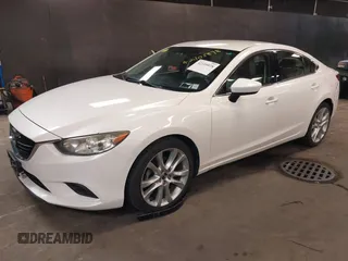2014 Mazda Mazda6 i Touring with VIN JM1GJ1V68E1147067, listed as a IAAI auction lot 42105878 with 102,684 mi miles. Bid and sale history available at carsss.com. Image 2.