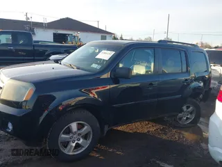 2009 Honda Pilot EX-L with VIN 5FNYF48659B012032, listed as a IAAI auction lot 41801232 with 205,636 mi miles and . Bid and sale history available at carsss.com. Image 14.