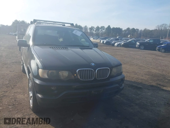 2003 BMW X5 4.4i with VIN 5UXFB33543LH43200, listed as a IAAI auction lot 41652303 with 169,250 mi miles. Bid and sale history available at carsss.com. Image 12.