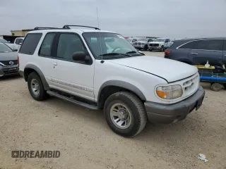 1999 Ford Explorer with VIN 1FMYU22E1XUA94061, listed as a Copart auction lot 44463165 with 172,246 mi miles and Salvage title. Bid and sale history available at DreamBid. Image 4.