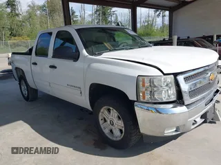 2013 Chevrolet Silverado 1500 LT with VIN 3GCPKSE71DG358722, listed as a IAAI auction lot 42128592 with 206,779 mi miles and . Bid and sale history available at DreamBid. Image 1.