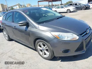 2014 Ford Focus SE z VIN 1FADP3K23EL282353, wystawiony jako IAAI lot #42146212 z przebiegiem 143 196 mil mil oraz . Historia ofert i sprzedaży dostępna na DreamBid. Obrazek 1.