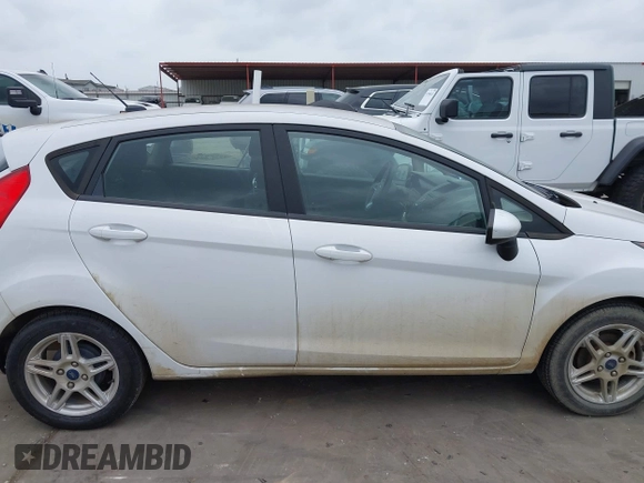 2019 Ford Fiesta SE with VIN 3FADP4EJ2KM157184, listed as a IAAI auction lot 41970286 with 68,900 mi miles. Bid and sale history available at carsss.com. Image 14.