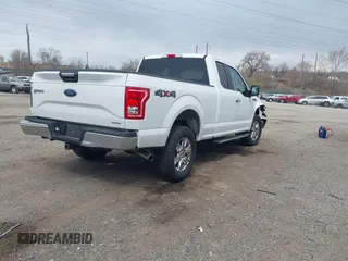 2015 Ford F-150 XLT with VIN 1FTFX1EFXFFC18381, listed as a IAAI auction lot 41886719 with 162,644 mi miles and . Bid and sale history available at DreamBid. Image 4.